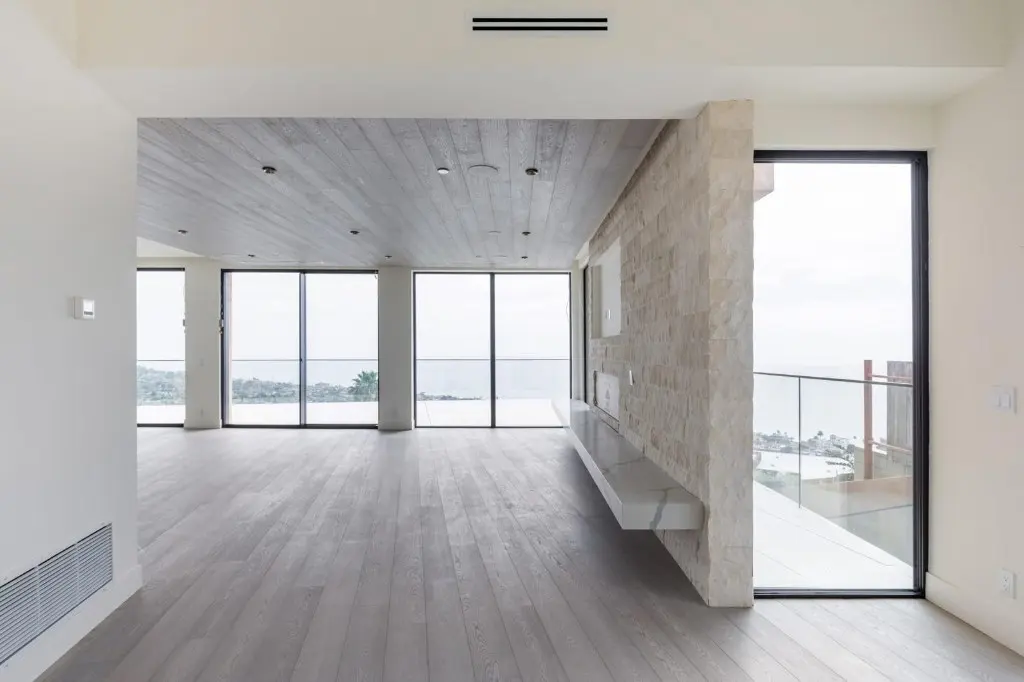 Living room with a long run of dark-framed windows
