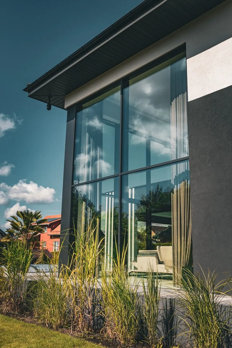 Inspiration, European project overseas: tall glass and aluminum entry