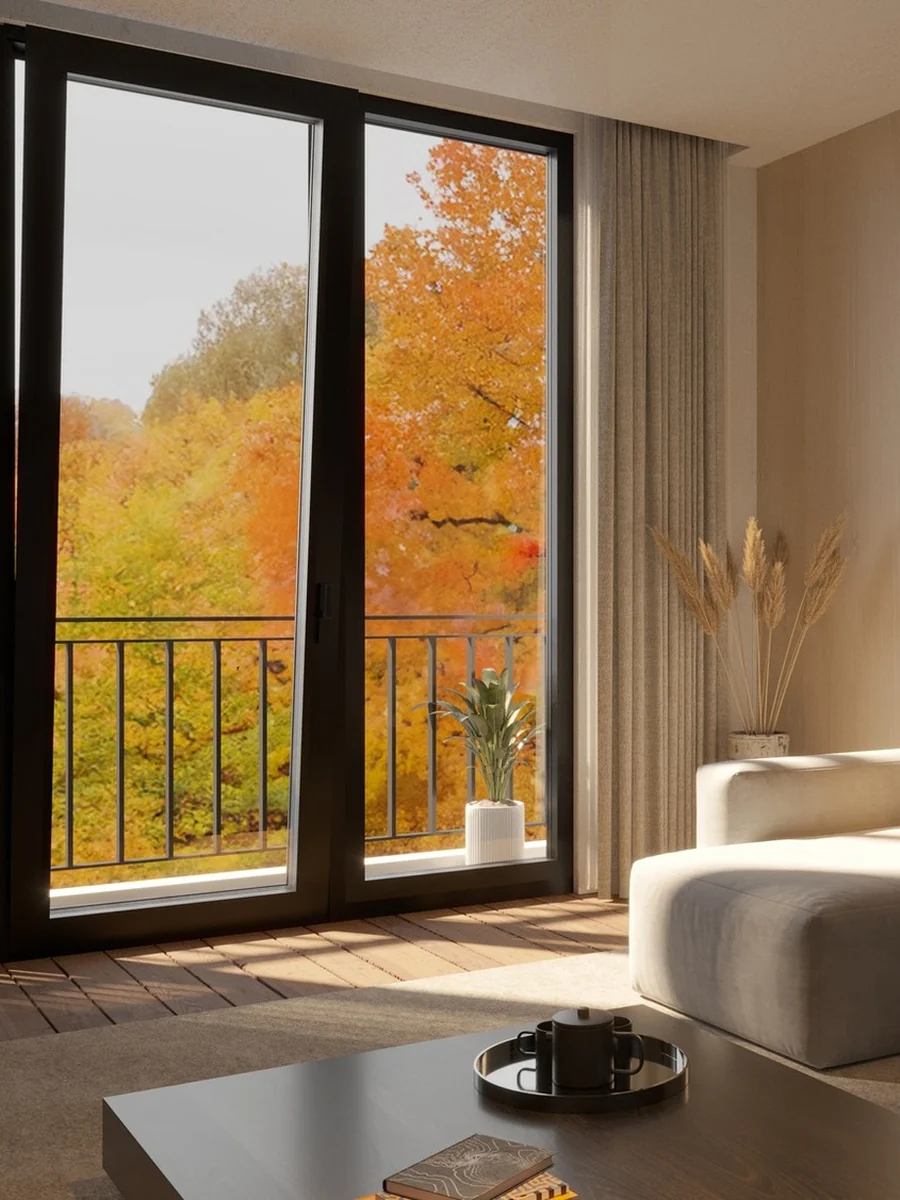 MasterLine 10 Elite aluminum balcony doors, dark frames, seen from a living room