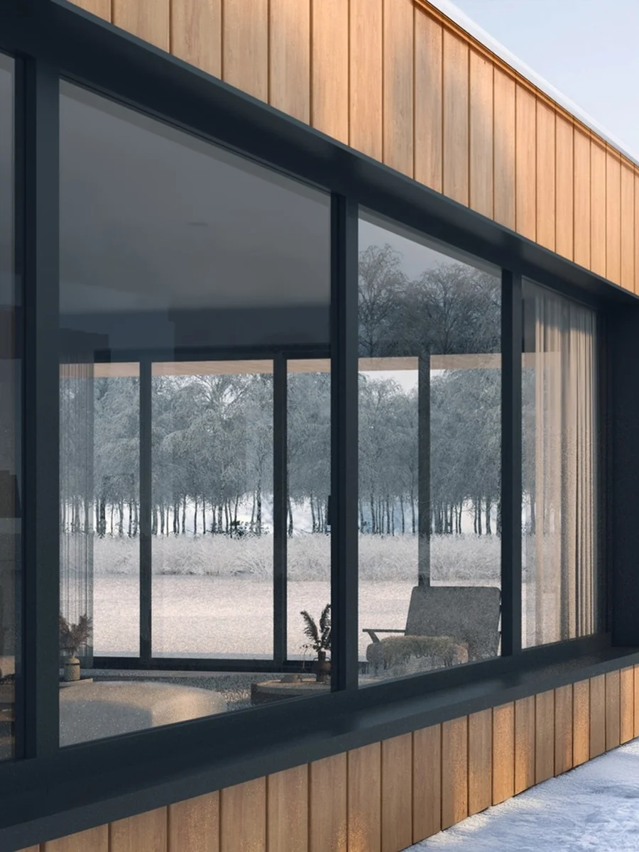 MasterLine 10 Elite aluminum corner window, dark frames, in a timber-clad wall