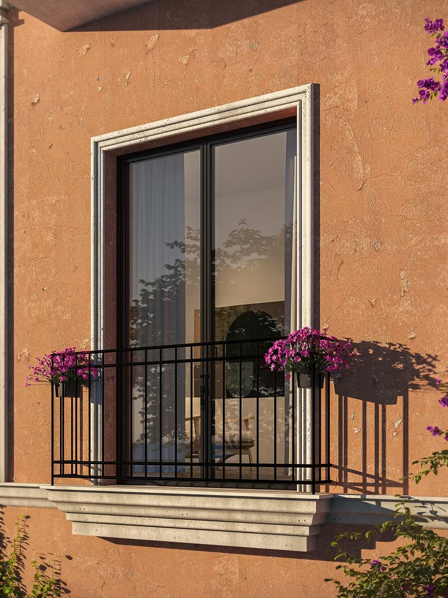 SlimLine Elite aluminum windows and balcony door, dark frames in a plaster facade